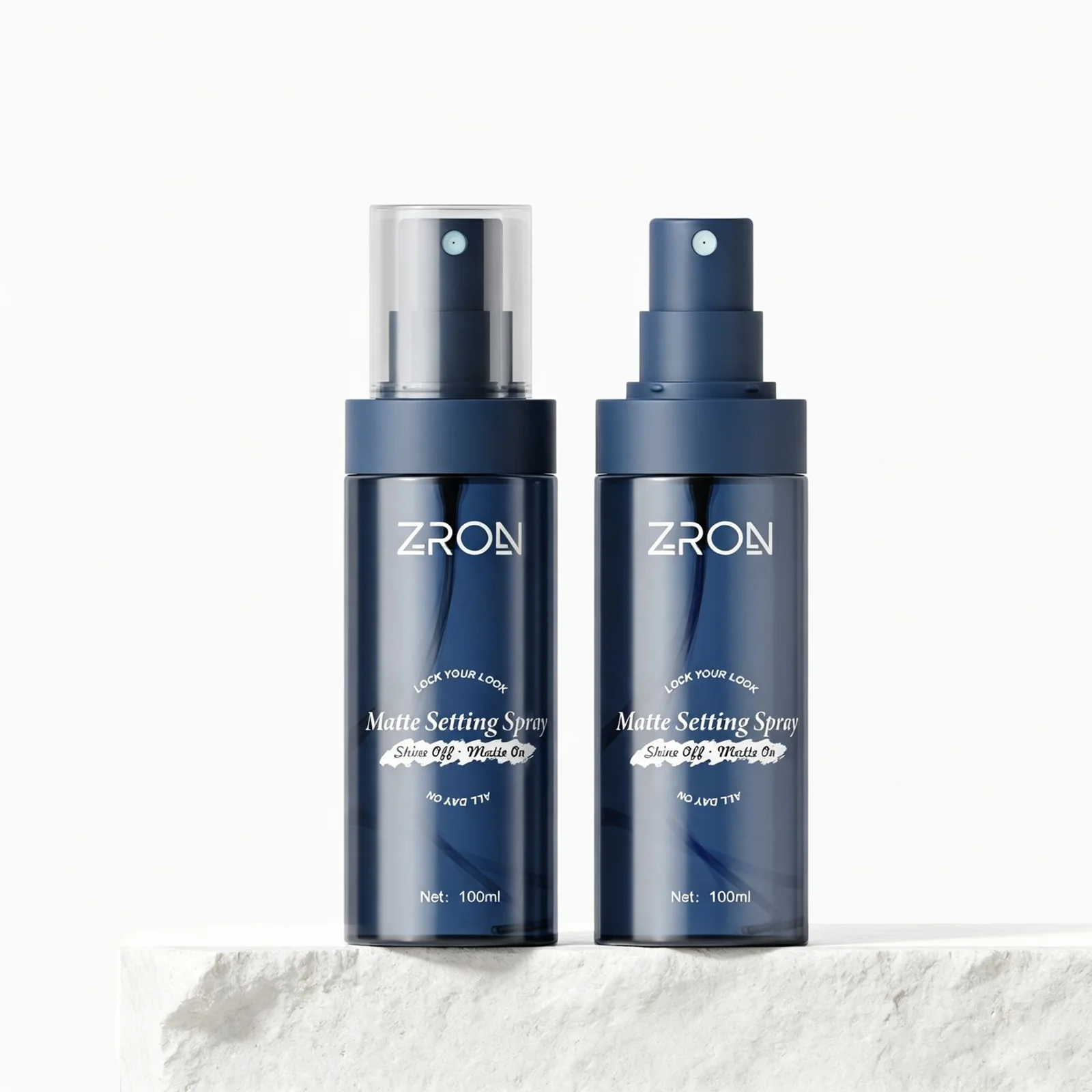 Blue mist spray bottles on stone